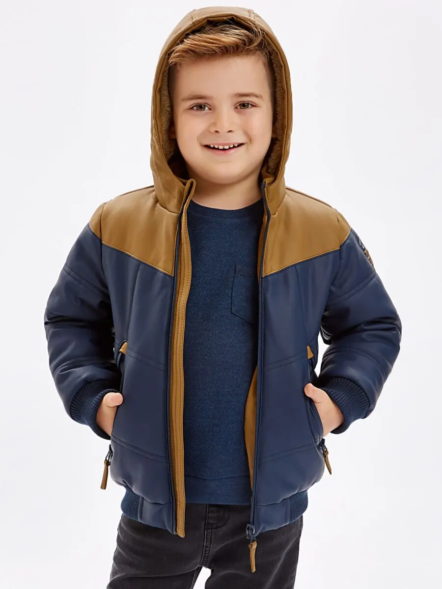 Promo LC Waikiki Maroc Manteau court en faux cuir garçon 289Dhs au lieu de 439Dhs