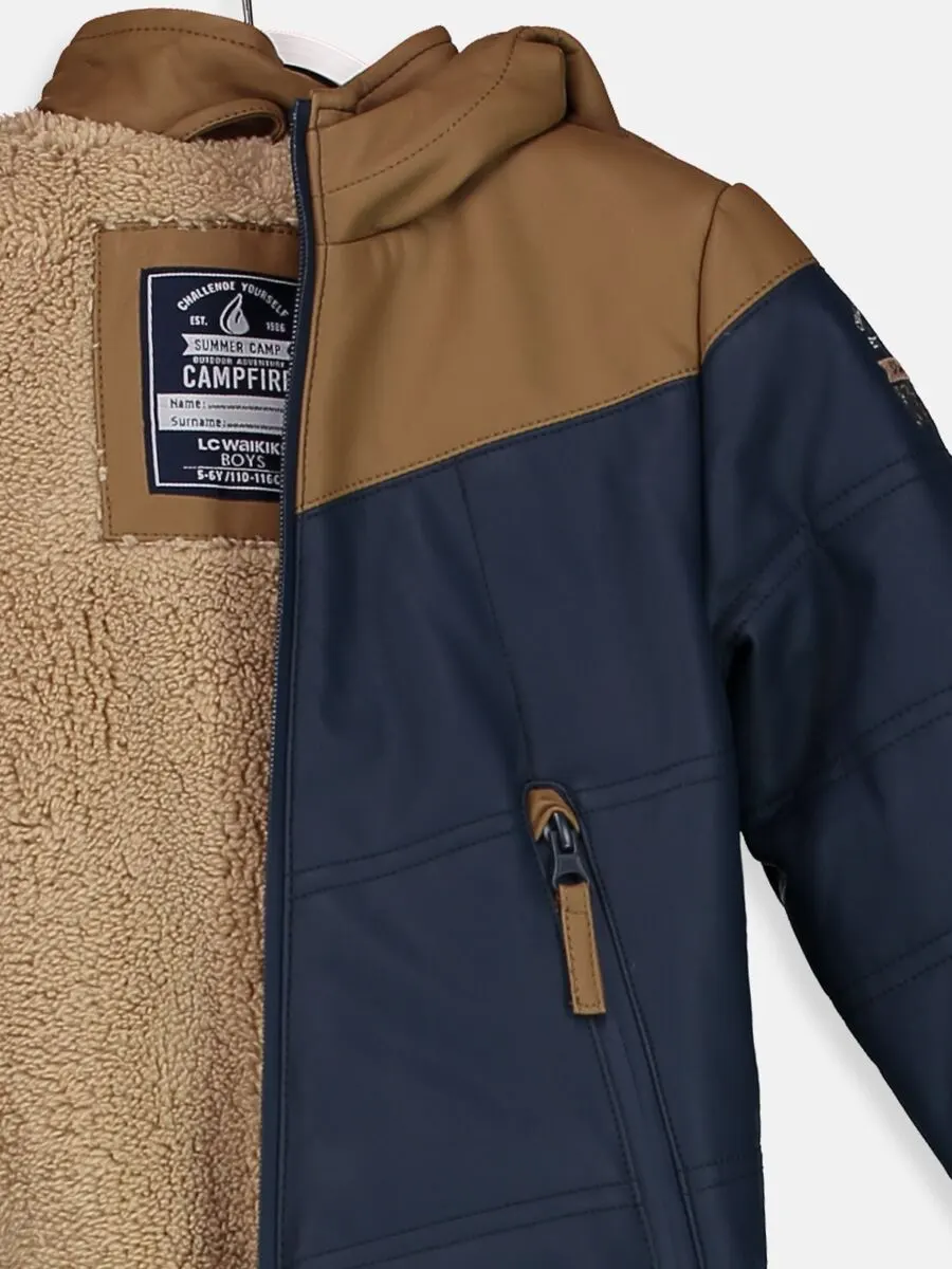 Promo LC Waikiki Maroc Manteau court en faux cuir garçon 289Dhs au lieu de 439Dhs