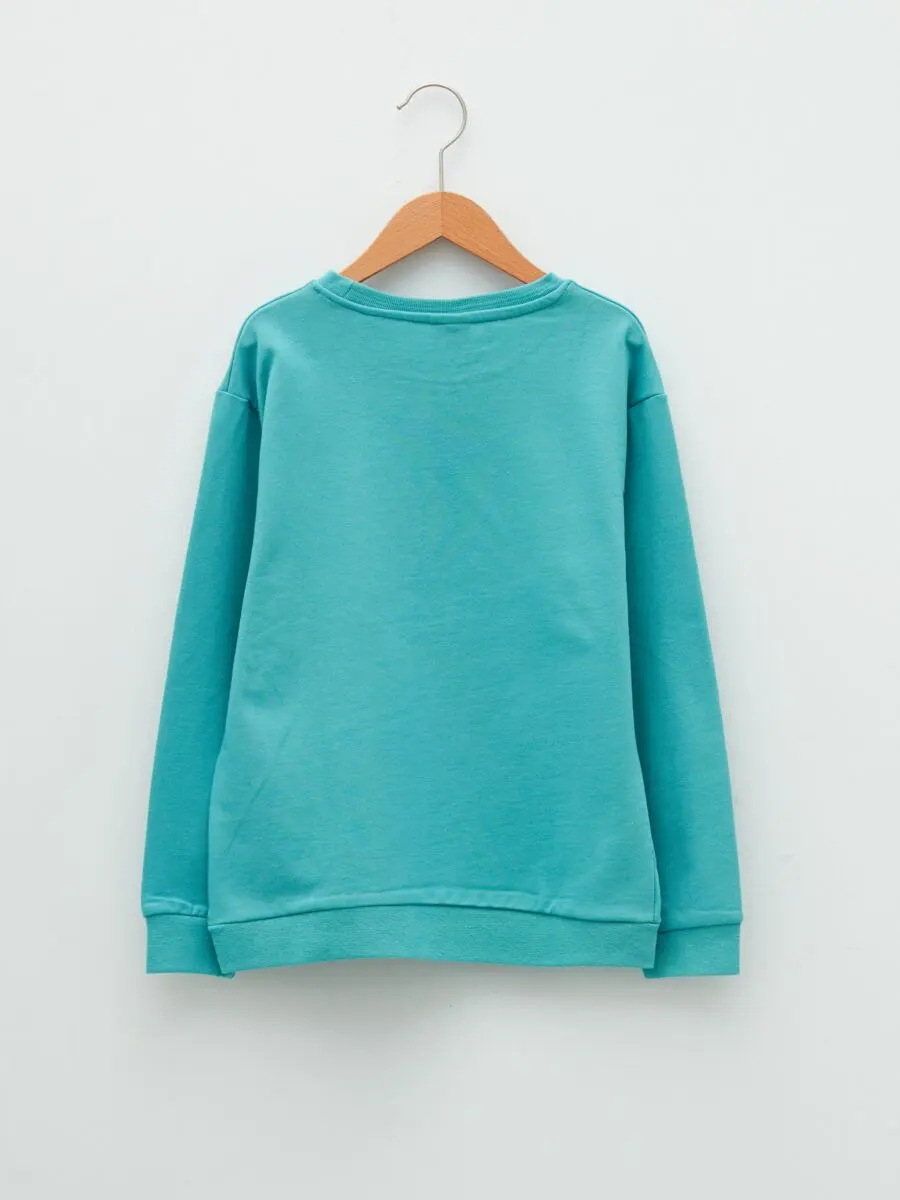 Soldes LC Waikiki Maroc Sweat-shirt col rond imprimé à manches longues pour garçon 97Dhs au lieu de 139Dhs